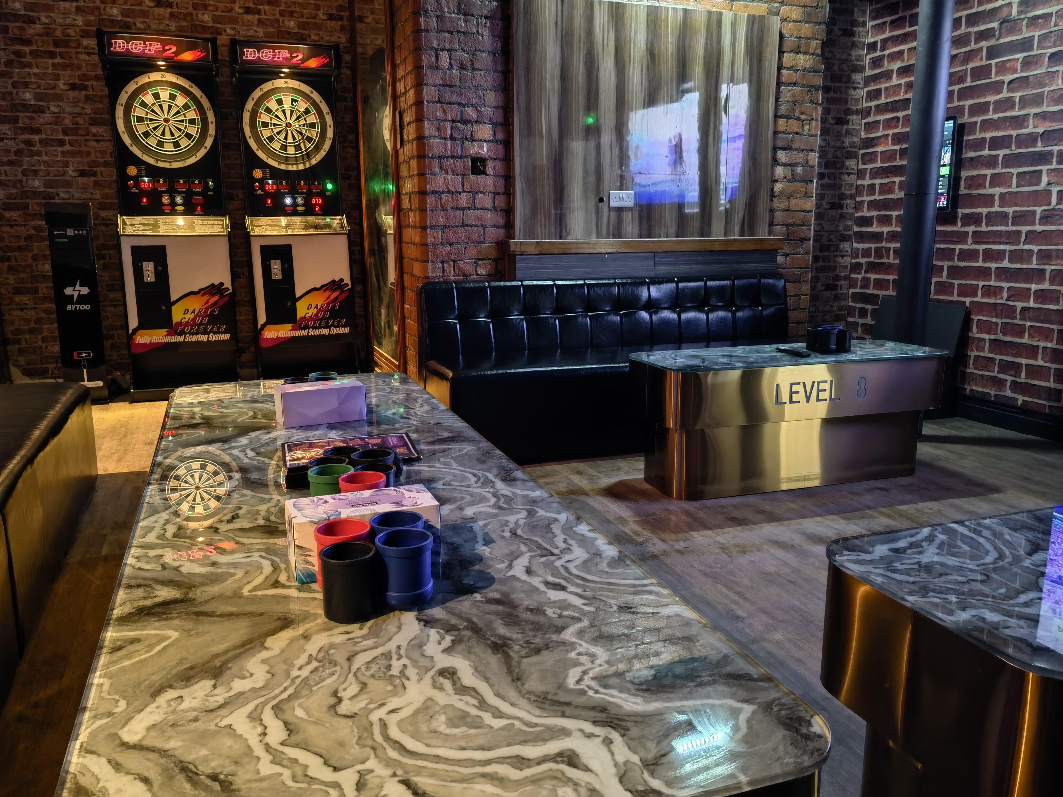 Large private karaoke room with sofas at Level 8 KTV